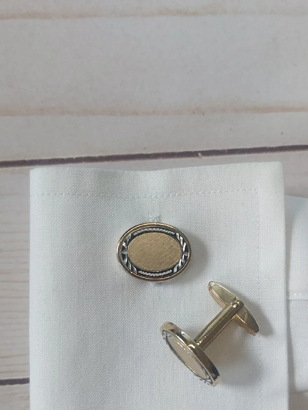 Gold-Tone Oval Cufflinks with Black Accent Border - Men's Accessories